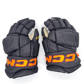 Gants de hockey CCM HGJSPP Pro Stock d'occasion (noir/or/marron) n° 1